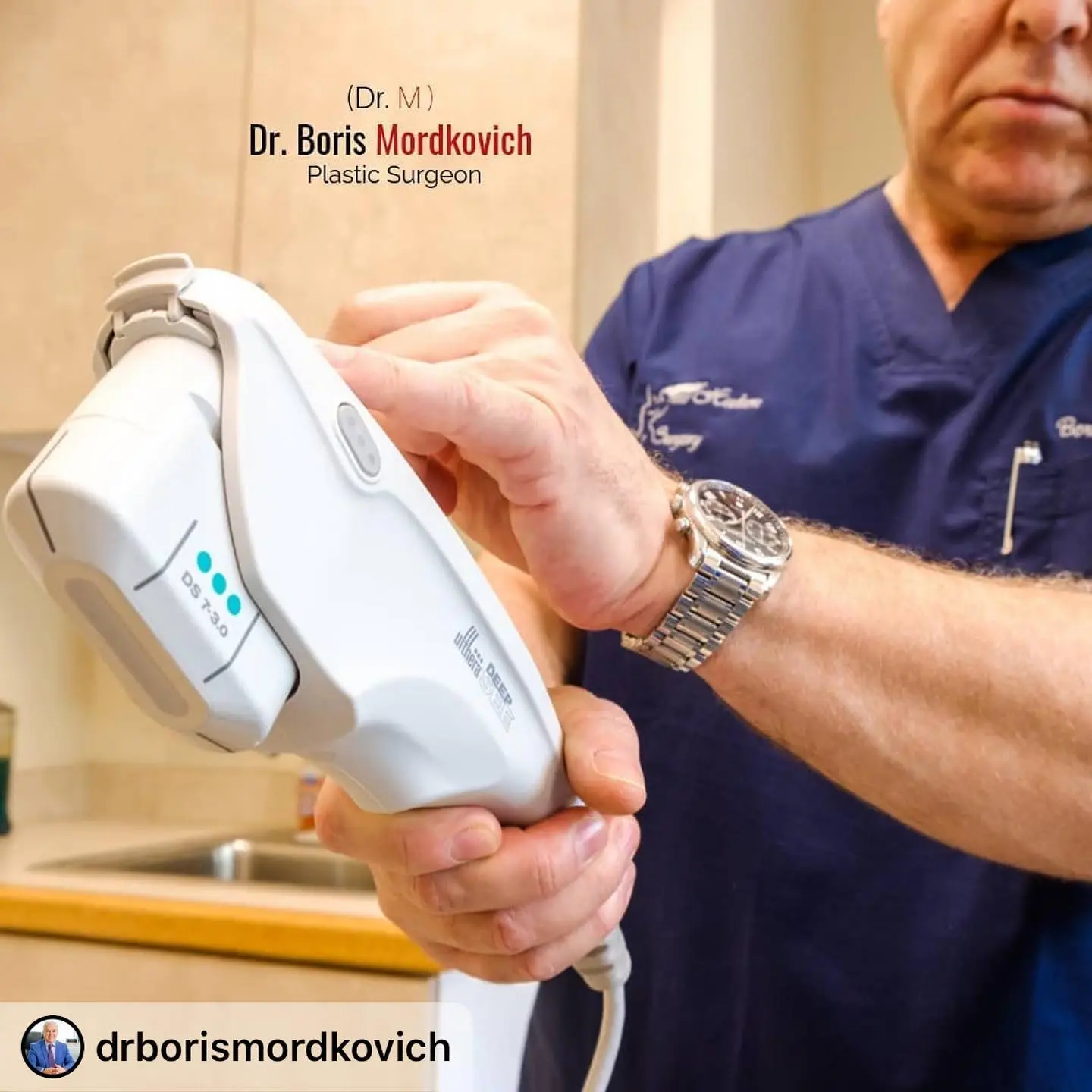 Dr. Boris Mordkovich holding a handheld ultrasound or radiofrequency device during a consultation